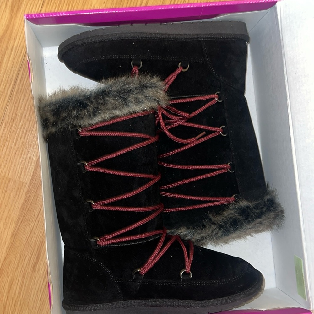 Black  boots with red stripes never been worn brand new at the box size 6 1/2